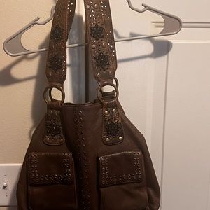 Betsy Johnson Brown Hobo. Black flowered interior